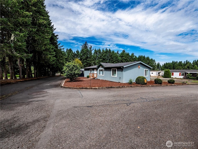 4805 Cushman Rd NE Unit 115, Olympia, WA 98506 - ranch-style house featuring asphalt driveway