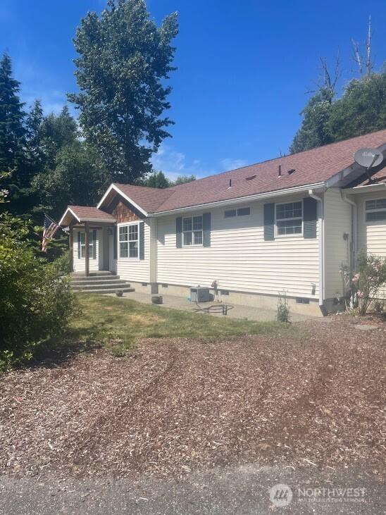7203 Erna Ln, Sedro Woolley, WA 98284 - view of front of house featuring crawl space