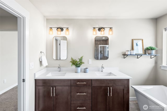 605 26th Avenue Ct, Milton, WA 98354 - bathroom featuring double vanity and a freestanding tub