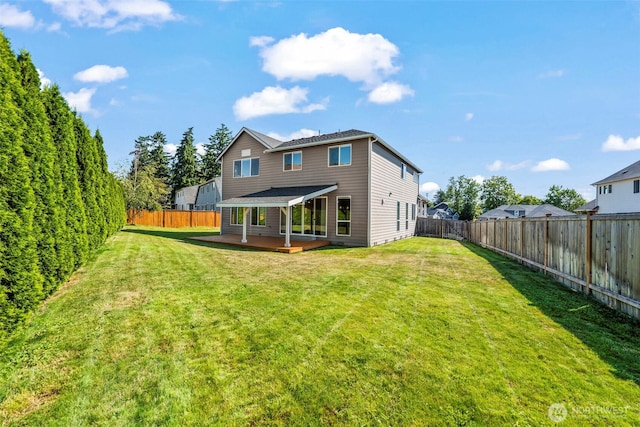 605 26th Avenue Ct, Milton, WA 98354 - rear view of house with a deck and a fenced backyard