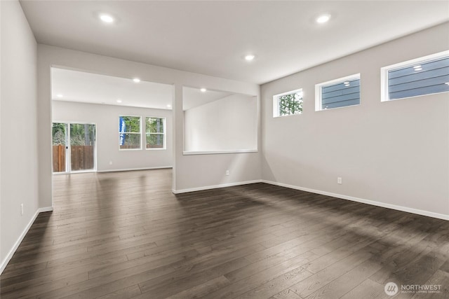 3912 23rd Ave NE Unit 38, Olympia, WA 98506 - empty room with healthy amount of natural light, dark wood-style flooring, and recessed lighting