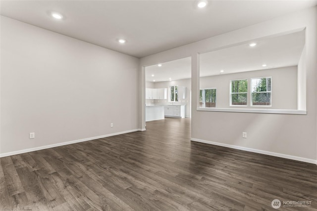 3912 23rd Ave NE Unit 38, Olympia, WA 98506 - unfurnished living room with recessed lighting and dark wood-style floors