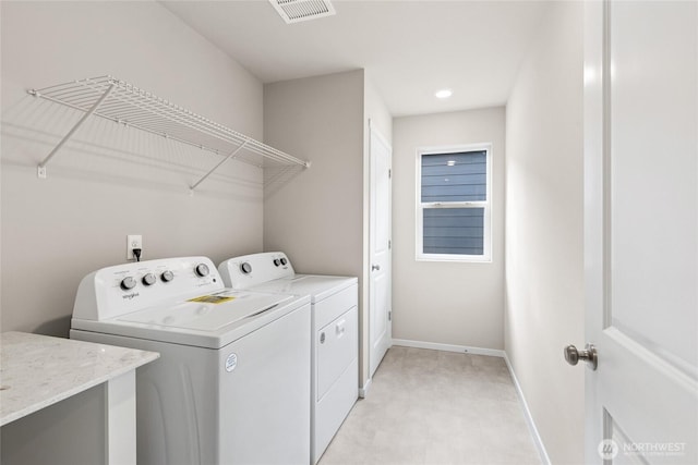 3912 23rd Ave NE Unit 38, Olympia, WA 98506 - washroom featuring washer and clothes dryer and baseboards
