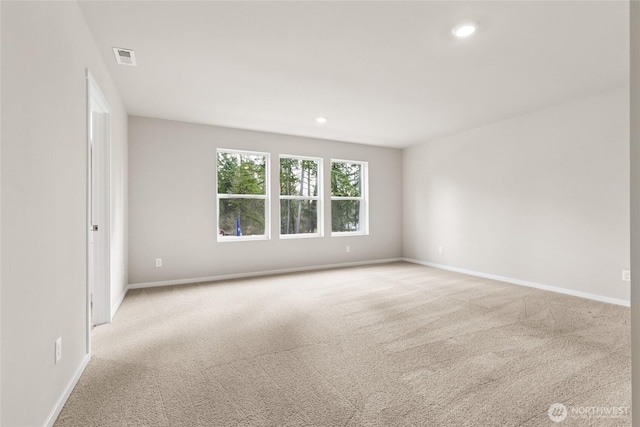 3912 23rd Ave NE Unit 38, Olympia, WA 98506 - spare room with light colored carpet and recessed lighting