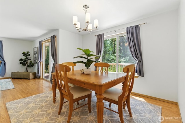127 E Barnacle Blvd, Shelton, WA 98584 - dining space with a chandelier and wood finished floors