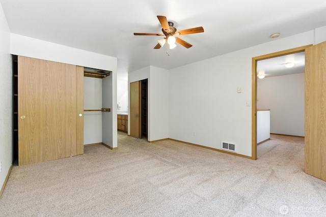 127 E Barnacle Blvd, Shelton, WA 98584 - unfurnished bedroom featuring light carpet and ceiling fan
