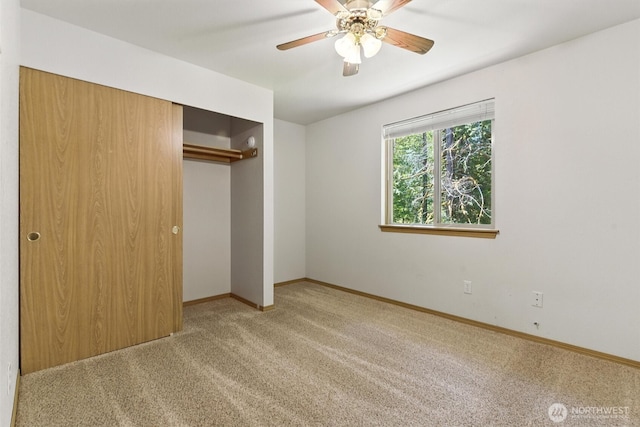 127 E Barnacle Blvd, Shelton, WA 98584 - unfurnished bedroom with light colored carpet, a closet, and a ceiling fan