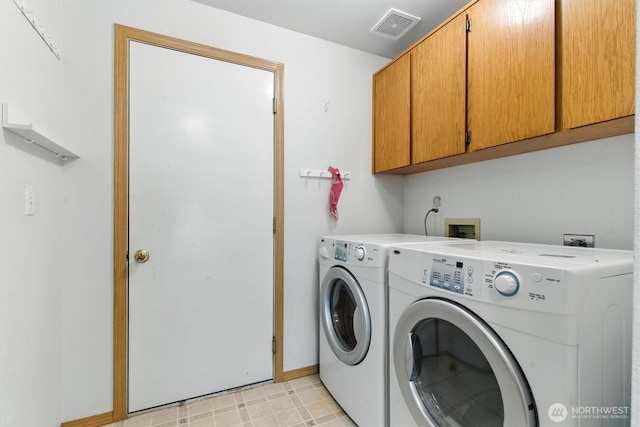 127 E Barnacle Blvd, Shelton, WA 98584 - washroom with cabinet space and separate washer and dryer
