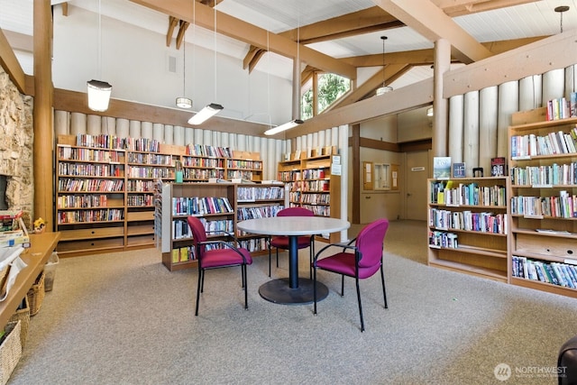 127 E Barnacle Blvd, Shelton, WA 98584 - carpeted dining space featuring beam ceiling and high vaulted ceiling
