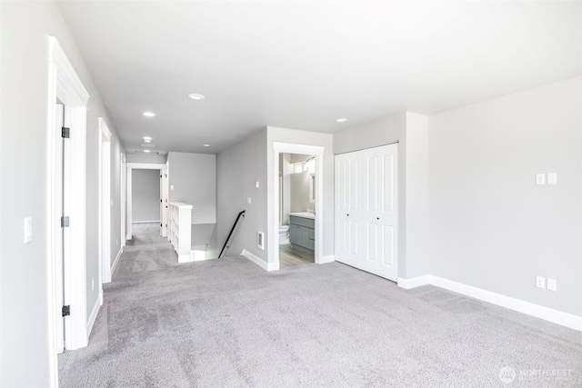 7830 A St, Tacoma, WA 98408 - unfurnished bedroom featuring light colored carpet, recessed lighting, a closet, and ensuite bathroom