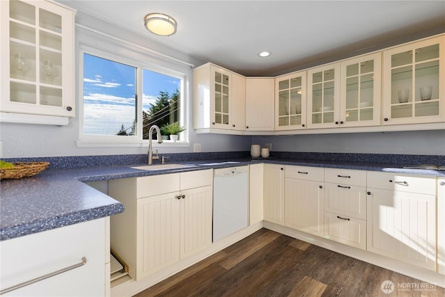 1418 W Mukilteo Blvd, Everett, WA 98203 - kitchen with white dishwasher, dark wood-style flooring, glass insert cabinets, dark countertops, and recessed lighting