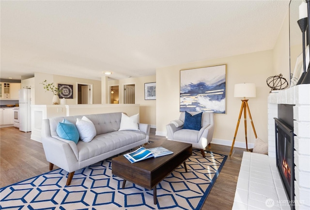 1418 W Mukilteo Blvd, Everett, WA 98203 - living room with wood finished floors and a fireplace
