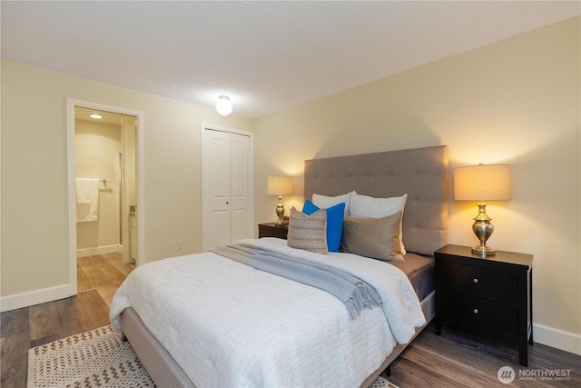 1418 W Mukilteo Blvd, Everett, WA 98203 - bedroom featuring wood finished floors, a closet, and ensuite bath