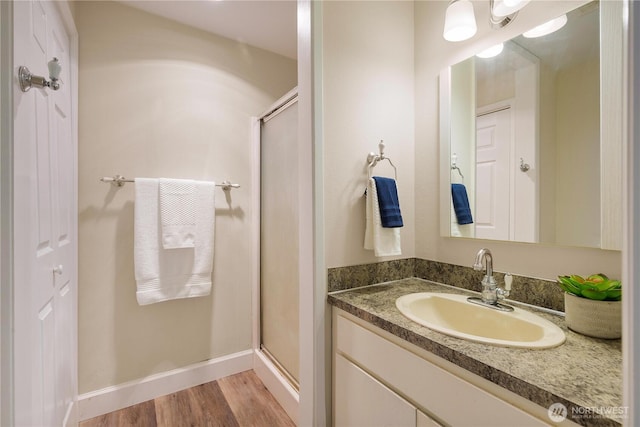 1418 W Mukilteo Blvd, Everett, WA 98203 - full bath featuring a stall shower, wood finished floors, and vanity