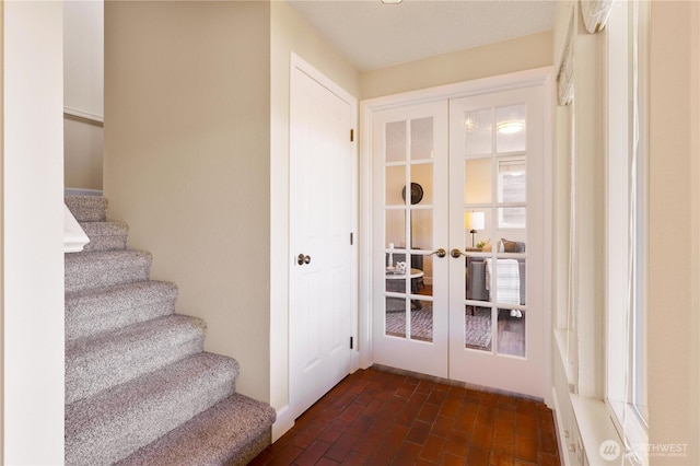 1418 W Mukilteo Blvd, Everett, WA 98203 - doorway with french doors, stairway, and brick flooring