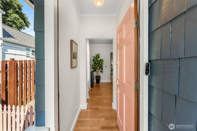 4506 46th Ave SW, Seattle, WA 98116 - hall featuring light wood finished floors, ornamental molding, and plenty of natural light