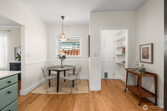 4506 46th Ave SW, Seattle, WA 98116 - dining space featuring light wood-style floors and plenty of natural light