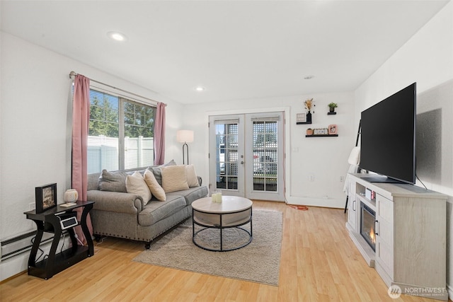 3302 W Tapps Dr E, Lake Tapps, WA 98391 - living room featuring light wood-type flooring, french doors, and recessed lighting
