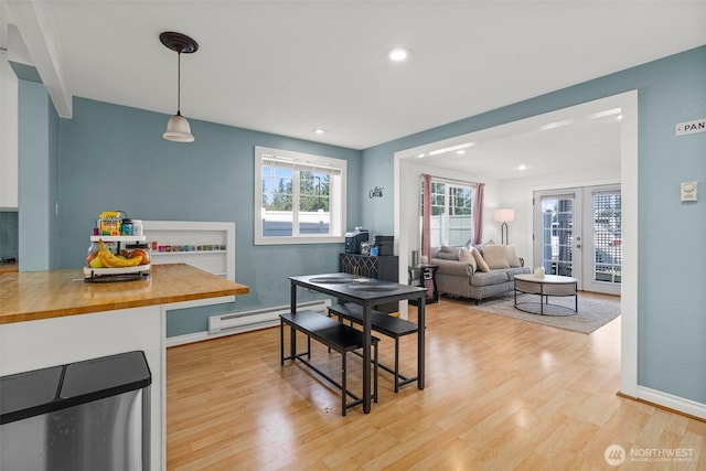 3302 W Tapps Dr E, Lake Tapps, WA 98391 - dining area with a baseboard radiator, light wood-style floors, french doors, and recessed lighting