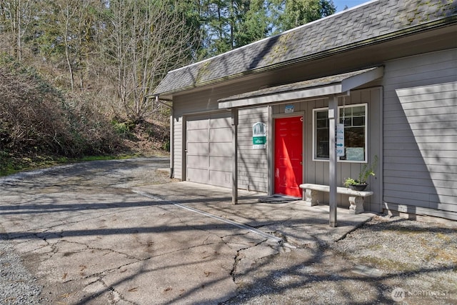 3302 W Tapps Dr E, Lake Tapps, WA 98391 - garage with asphalt driveway