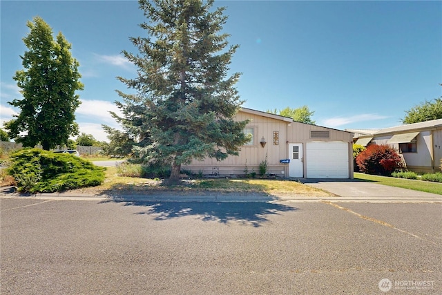 589 Criscola Ave, College Place, WA 99324 - view of front of property featuring an attached garage and concrete driveway