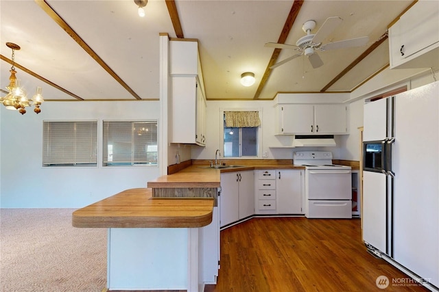589 Criscola Ave, College Place, WA 99324 - kitchen featuring white appliances, a peninsula, under cabinet range hood, and white cabinets