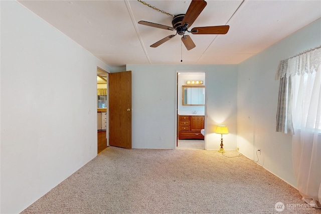 589 Criscola Ave, College Place, WA 99324 - spare room featuring light colored carpet and a ceiling fan