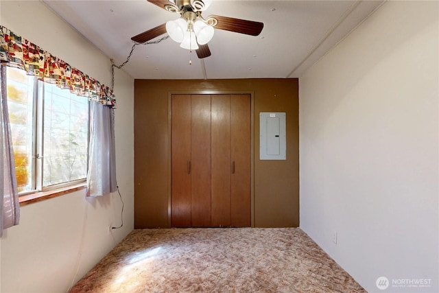 589 Criscola Ave, College Place, WA 99324 - unfurnished bedroom featuring electric panel, a closet, carpet, and ceiling fan