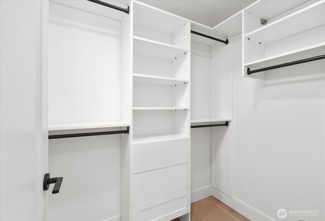 747 N 71st St, Seattle, WA 98103 - walk in closet with wood finished floors