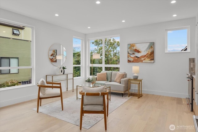 747 N 71st St, Seattle, WA 98103 - living room featuring light wood-style floors and recessed lighting