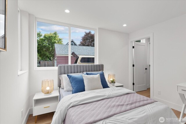 747 N 71st St, Seattle, WA 98103 - bedroom featuring recessed lighting and wood finished floors
