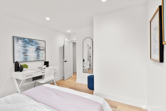 747 N 71st St, Seattle, WA 98103 - bedroom with light wood-style floors and recessed lighting
