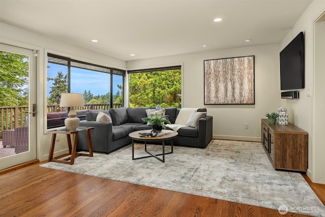 19081 11th Ave NW, Shoreline, WA 98177 - living area featuring wood finished floors and recessed lighting