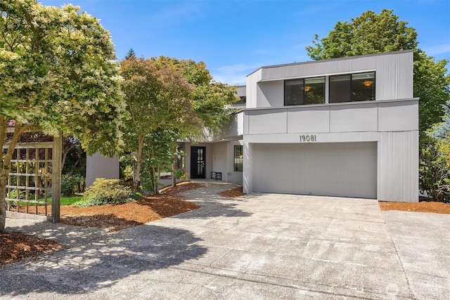 19081 11th Ave NW, Shoreline, WA 98177 - contemporary home with driveway and a garage