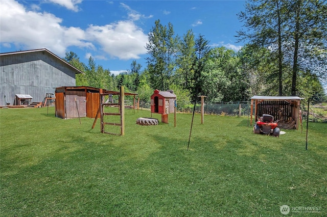 12310 Morris Rd SE, Yelm, WA 98597 - view of grassy yard featuring an outdoor structure