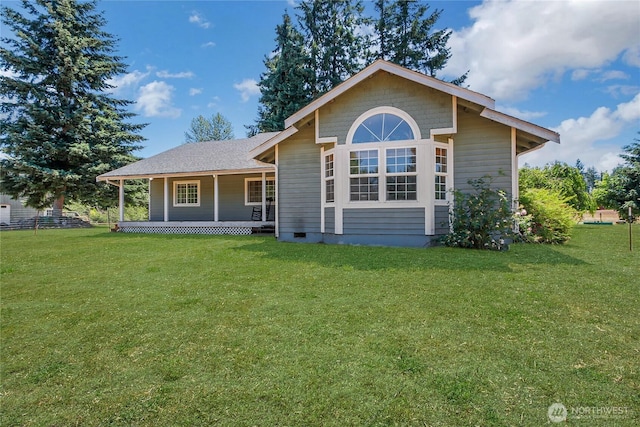 12310 Morris Rd SE, Yelm, WA 98597 - back of house featuring covered porch and a lawn