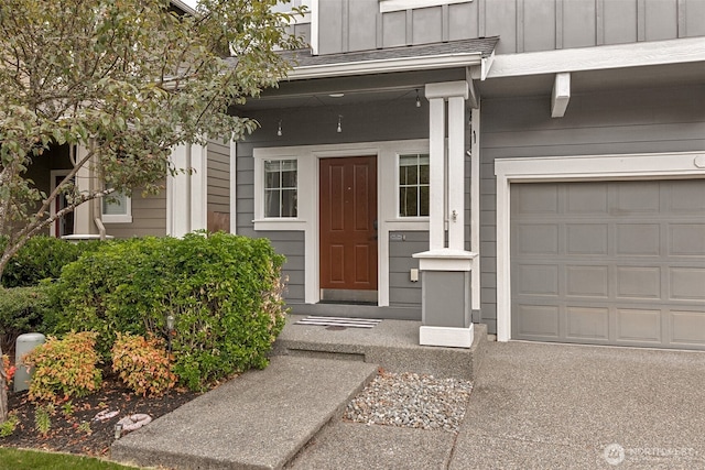 7022 Raptor Ave NE, Lacey, WA 98516 - entrance to property with board and batten siding and a garage