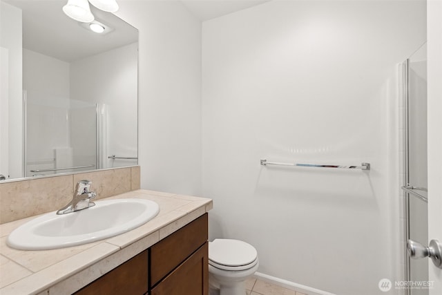 7022 Raptor Ave NE, Lacey, WA 98516 - full bathroom featuring vanity, a shower, and tile patterned flooring