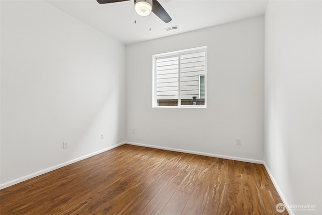 7022 Raptor Ave NE, Lacey, WA 98516 - spare room with hardwood / wood-style flooring and ceiling fan
