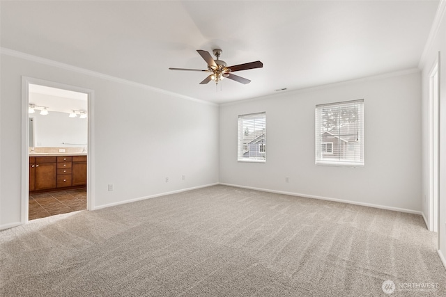 7022 Raptor Ave NE, Lacey, WA 98516 - unfurnished bedroom featuring ornamental molding, carpet floors, ensuite bath, and ceiling fan