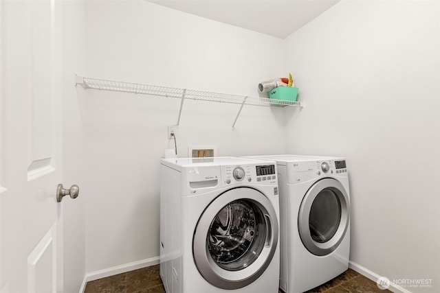 7022 Raptor Ave NE, Lacey, WA 98516 - washroom with washer and clothes dryer and baseboards