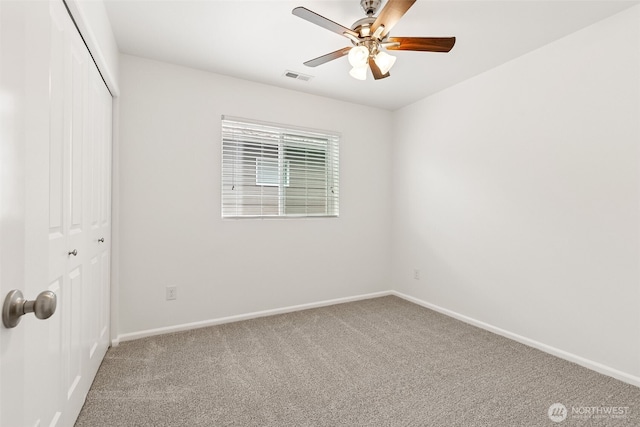 7022 Raptor Ave NE, Lacey, WA 98516 - unfurnished bedroom with a closet, carpet, and ceiling fan