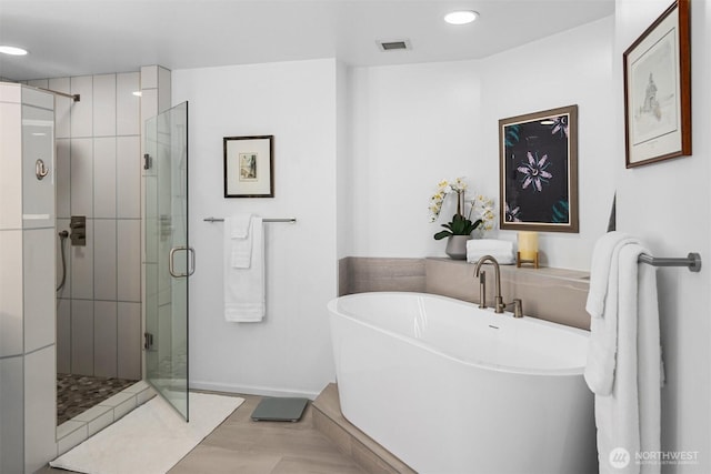 177 107th Ave NE Unit 1906, Bellevue, WA 98004 - full bathroom with a stall shower, a freestanding tub, and recessed lighting