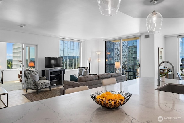 177 107th Ave NE Unit 1906, Bellevue, WA 98004 - living room with plenty of natural light and wood finished floors