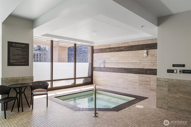 177 107th Ave NE Unit 1906, Bellevue, WA 98004 - view of pool with an in-ground hot tub