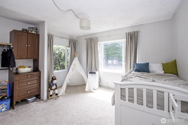 1729 154th St S, Spanaway, WA 98387 - bedroom featuring light colored carpet and a textured ceiling