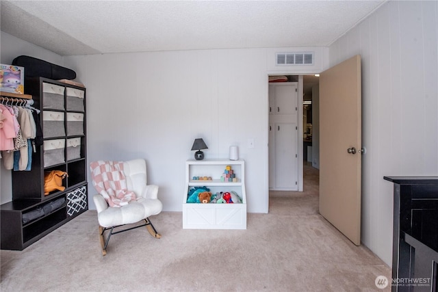 1729 154th St S, Spanaway, WA 98387 - living area featuring carpet flooring and a textured ceiling