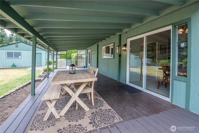 1729 154th St S, Spanaway, WA 98387 - wooden terrace featuring an outbuilding and outdoor dining area