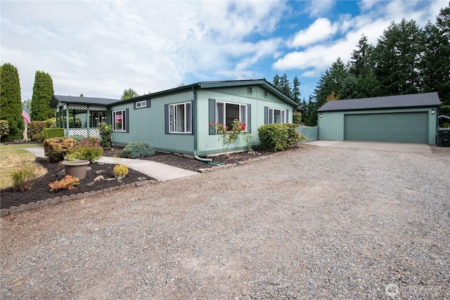 1729 154th St S, Spanaway, WA 98387 - view of front of property featuring driveway, an outdoor structure, and a garage