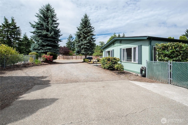 1729 154th St S, Spanaway, WA 98387 - view of property exterior with driveway